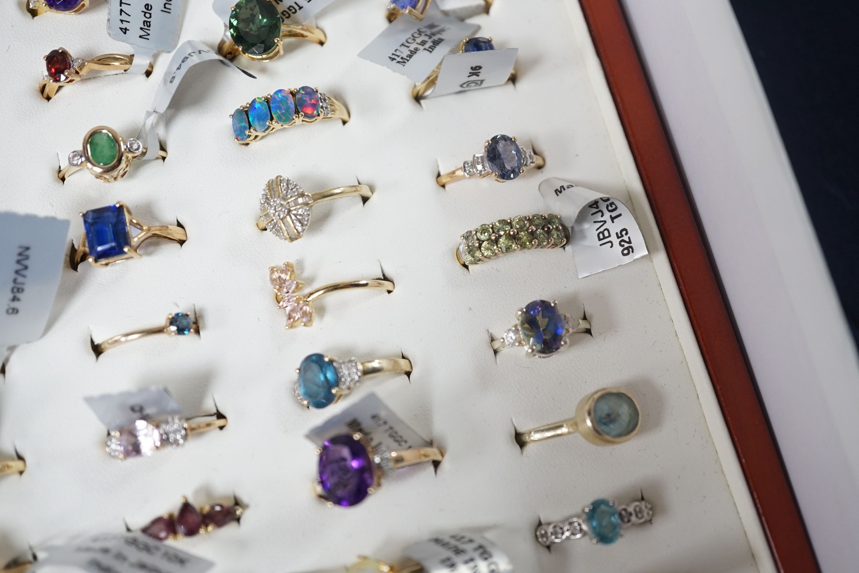 A collection of forty five assorted 9ct gold and gem set rings, including opal, emerald and amethyst, one 14ct gold and gem set ring and four 925 rings.